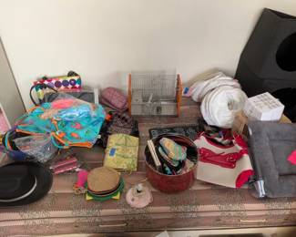 purses, hats, pet supplies, box spring and mattress. headboard