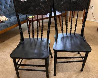 pressed back chairs, painted black