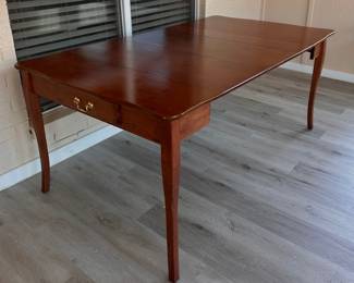 ...to a full size dining table with 2 leaves