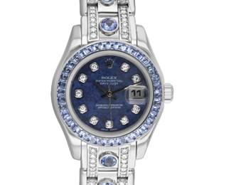 Lot 255 Rolex Masterpiece with Blue Sapphire  Diamonds
