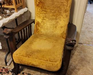 Morris chair with lions heads, claw feet