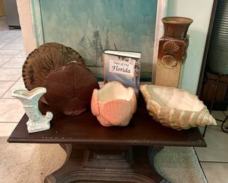 Both shell vases are sold.