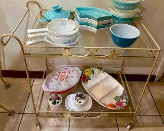 Pyrex 3 covered dishes on the far right and the Corningware cornflower casseroles are sold.