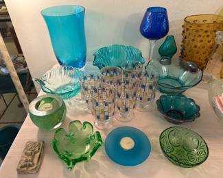 The Libby footed glasses in the middle and amber hobnail vase are sold.