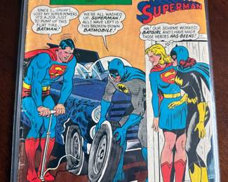 First Supergirl/Batgirl meeting