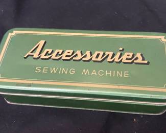 Small metal sewing tin