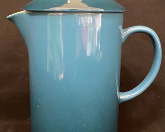 a Le Creuset Stoneware French Press in the color turquoise