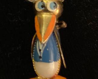a vintage Donald Duck "jelly belly" pin brooch produced in Spain, likely dating back to the 1930s