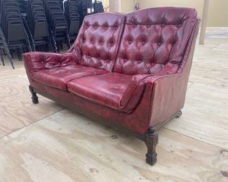 1970s Gothic-style red pleather loveseat