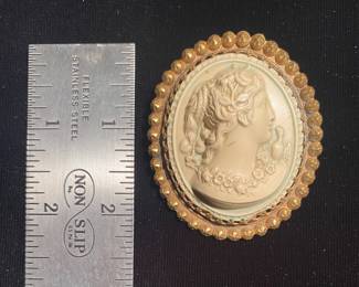 Vintage celluloid cameo pin