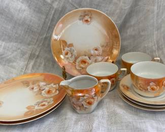 a vintage tea set or porcelain collection likely produced by Reinhold Schlegelmilch, often marked as "RS Germany" or "RS Prussia“