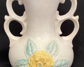 a vintage Hull Pottery vase, likely from the popular "Wildflower" or "Camellia" line produced in the 1940s
