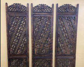 3 panels of carved wood