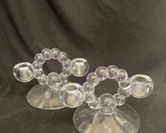 a pair of vintage Imperial Glass Co. double-light candlestick holders in the "Candlewick" pattern