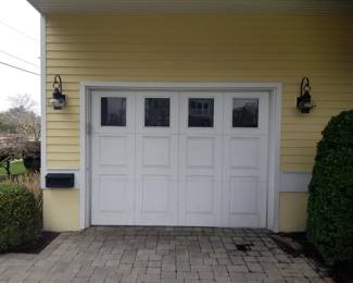 Garage door with opener; exterior lights
