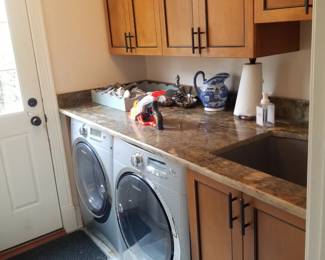 Laundryroom cabinetry; Electrolux washer & dryer