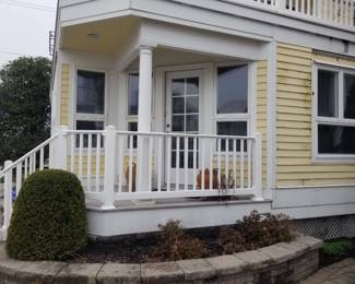 Entry door; vinyl railing; Trex decking