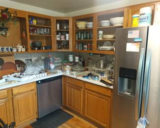 More pots, pans and kitchen storage.  Pyrex and corningware