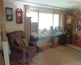 Clocks, chair and decor