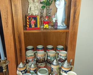 Porcelain ladies and german steins