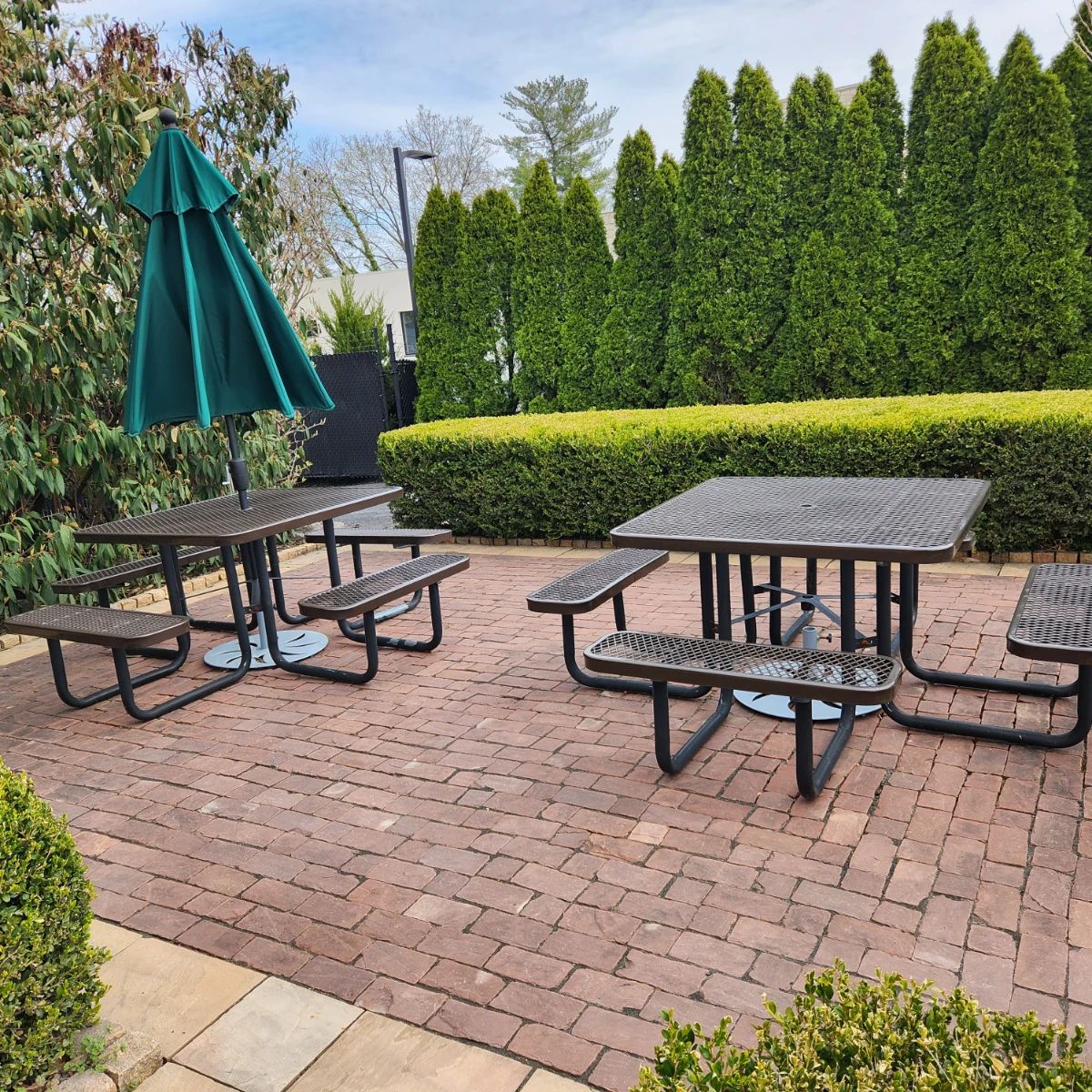 2 metal picnic tables, with 1 matching 8 foot bench