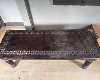 mahogany table with brass accents