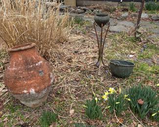 assorted metal pots and Lamu jug