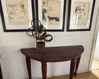 carved half oval mahogany console table