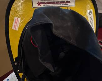 UNDER SIDE OF FIREMAN'S HELMET