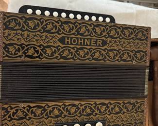 #93 - $320 -Hohner steel reed diatonic accordion 