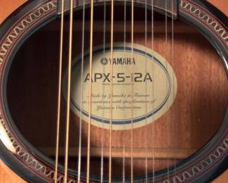 #79 - $300 -Yamaha 12 string guitar in case APX-5-12A