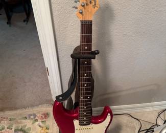 #80 - $900-Fender Stratocaster E96 42 35 guitar with stand and case - made in Japan