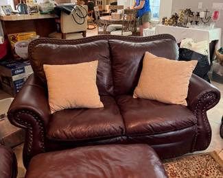 #15 - $300 - Leatherette nail head burgundy loveseat 64x40dx38t