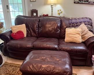 #14 - $400 - Leatherette nail head burgundy sofa 7ftx40dx38t