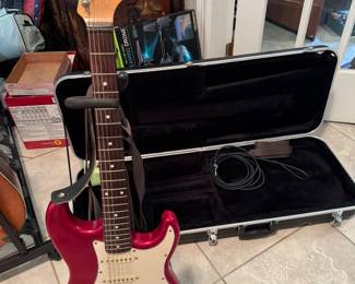 #80 - $900-Fender Stratocaster E96 42 35 guitar with stand and case - made in Japan