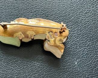 $120 - White & green jade monkey resting on branch 10kt gold setting. 