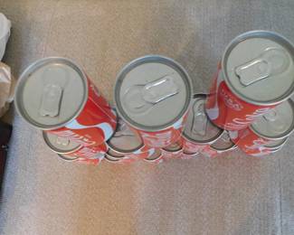 TOP OF COKE CANS