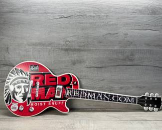 METAL RED MAN SNUFF GUITAR WALL ART