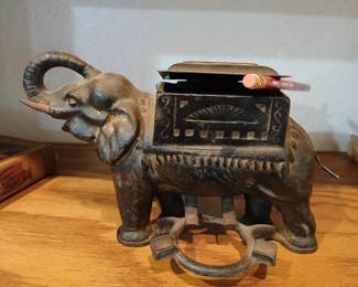 Cast iron elephant cigarette dispenser
