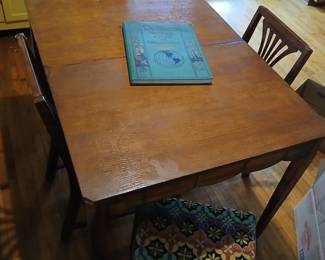 Table and chairs. World atlas