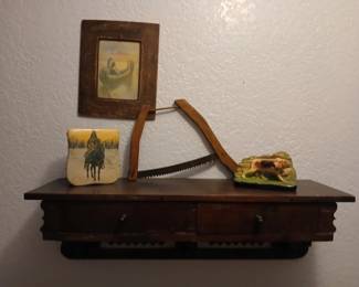 Chalk dog bookends, salesman sample buck saw . Indian trinket box. And leather framed Indian print