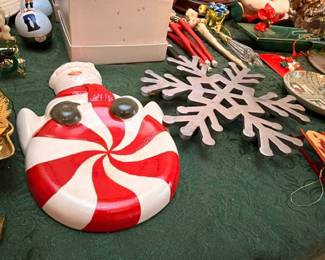 Peppermint snowman figurine and white snowflake Christmas decor