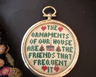 Framed cross-stitch sampler with friendship quote