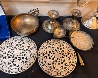 Sterling silver candlesticks, bowl, and pierced trivets
