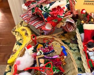 Christmas ornaments and ribbons in basket