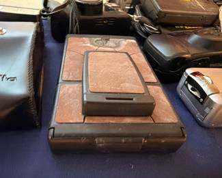 Vintage Polaroid camera and accessories