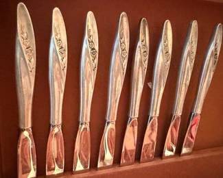 Sterling silver knives with rose pattern, set of 8