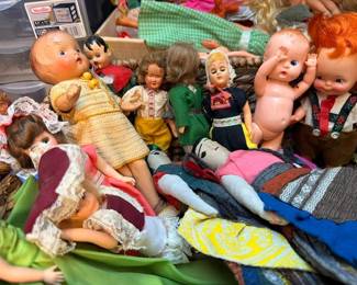 Vintage doll collection including international folk dolls