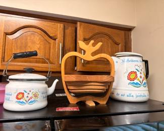 Scandinavian enamel teapots and folding wood basket