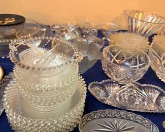 Hobnail glass plates and cut crystal bowls